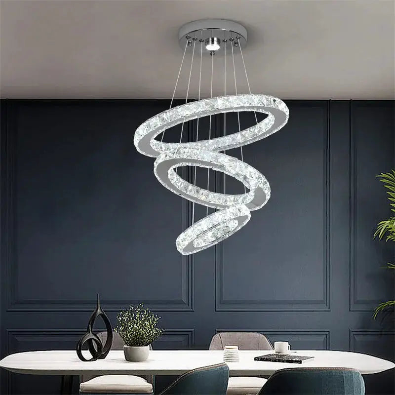 Crystal ring LED chandelier by Simples Market with spiral crystal rings and chrome finish