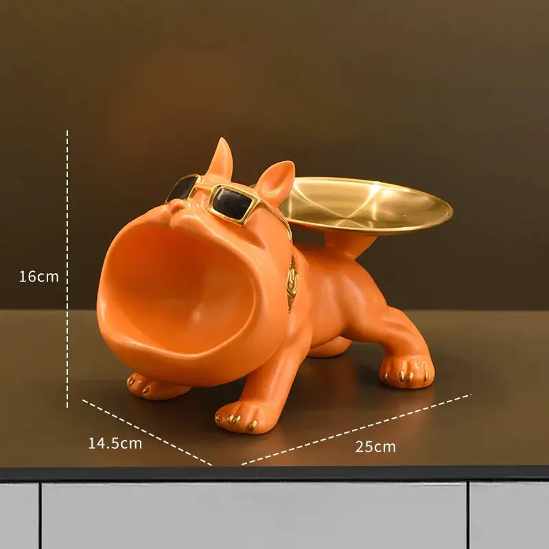 Resin bulldog statue storage tray in orange with a gold tray on its back by Simples Market
