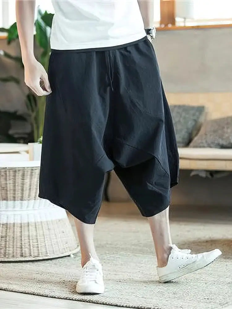 Men's black wide-leg baggy capri shorts, lightweight cotton-linen blend.