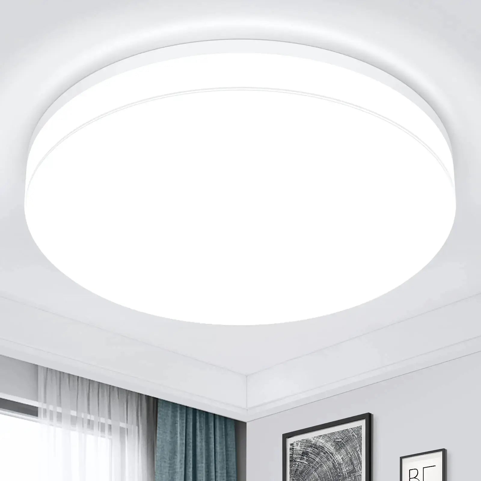 IRALAN ultra-thin round LED ceiling light, white flush-mount fixture in a modern living room.