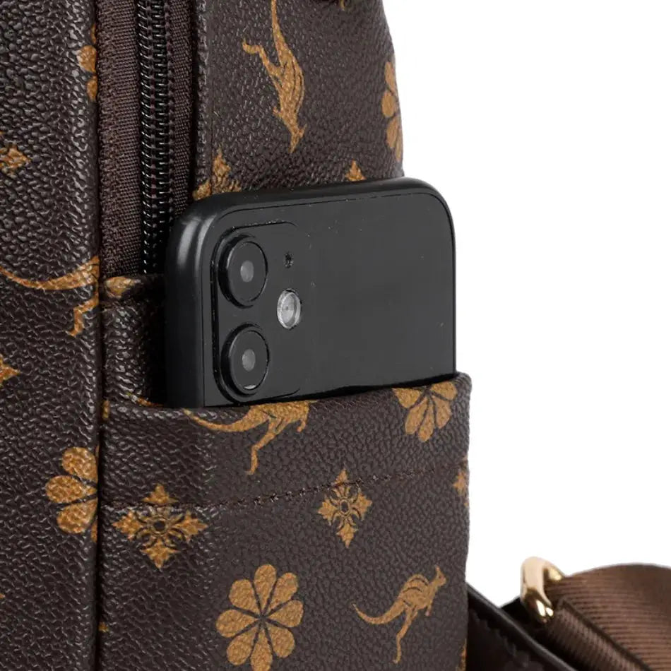 Ladies leather backpack in brown with gold floral print and tassel, large-capacity with a side smartphone pocket