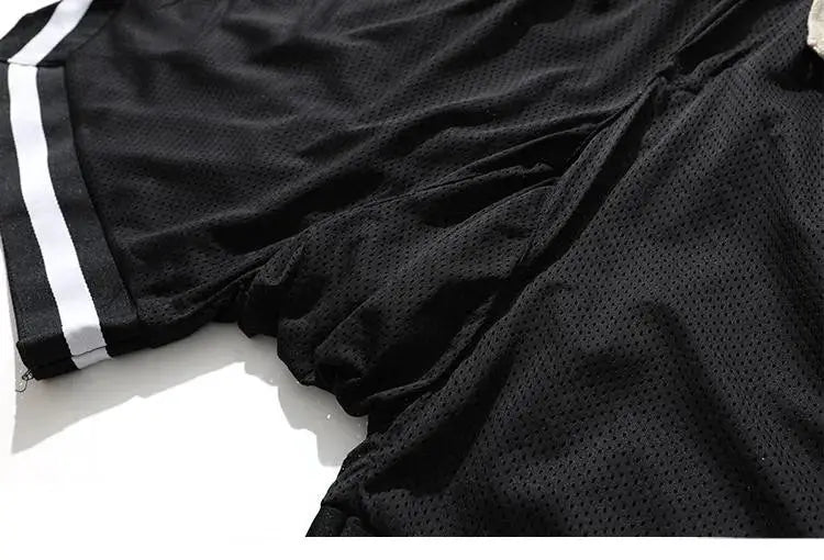 Men's black mesh basketball shorts, quick-dry, loose fit, large size.