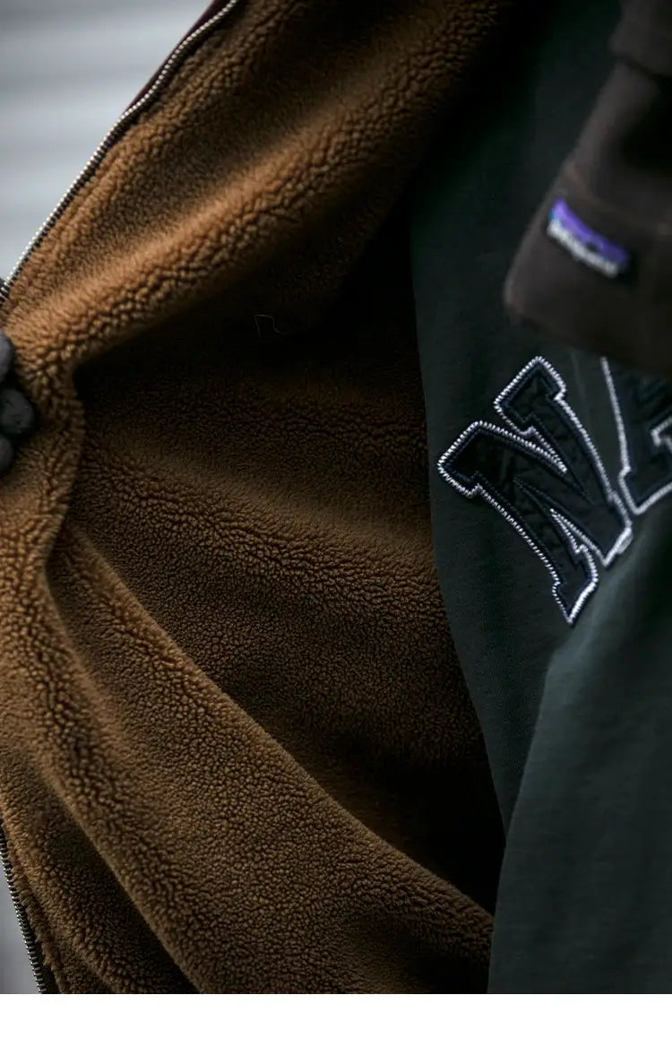 Men's Japanese vintage polar fleece jacket with brown fleece lining and black exterior featuring embroidered lettering.