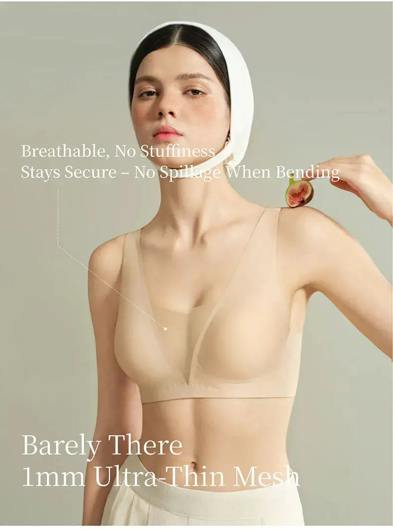 Seamless nude plunge push-up bra with ultra-thin mesh, wireless design, worn by model for everyday wear.