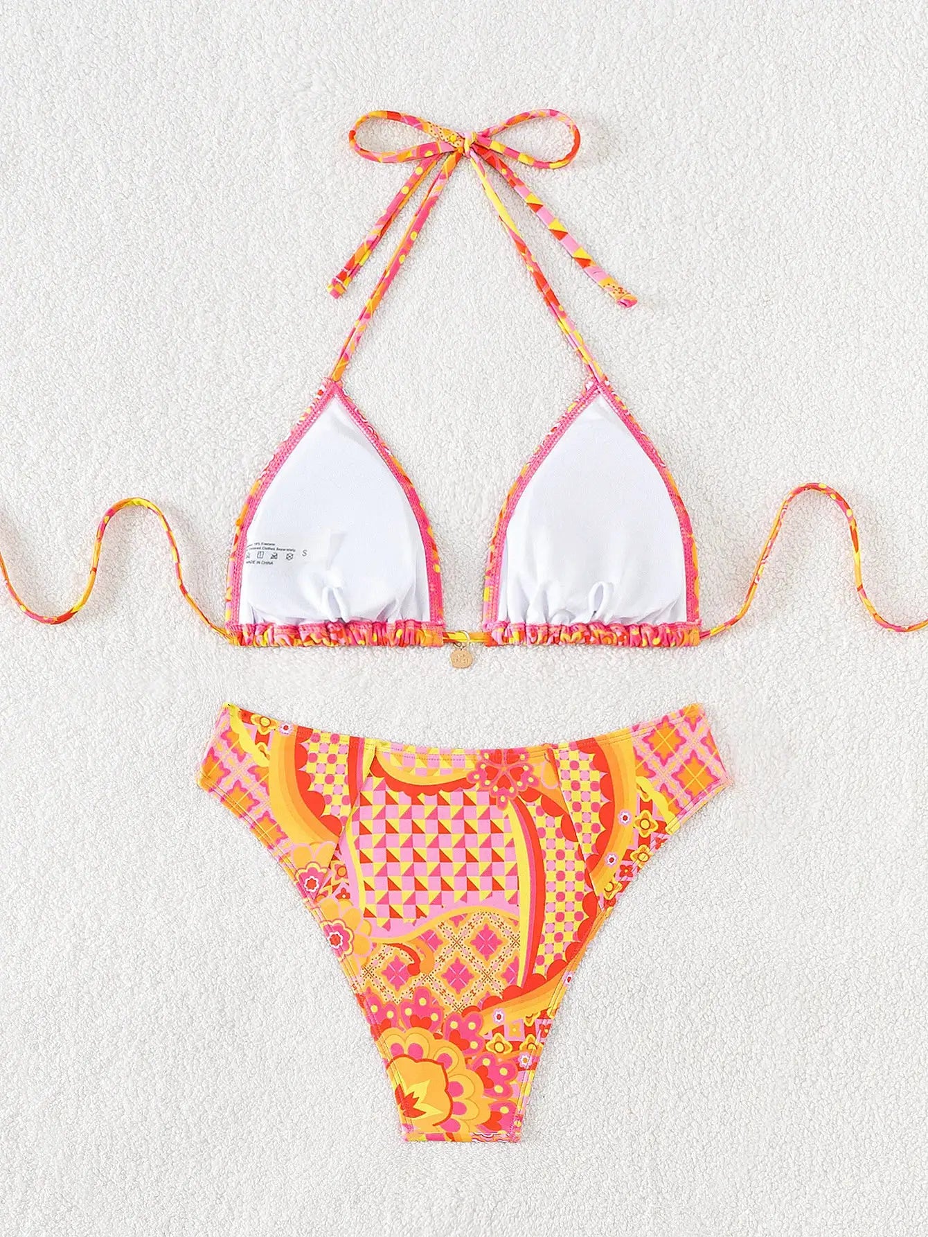 Simples Market triangle bikini set with white push-up top and vibrant pink-orange trim, floral Brazilian bottoms (2 pieces)