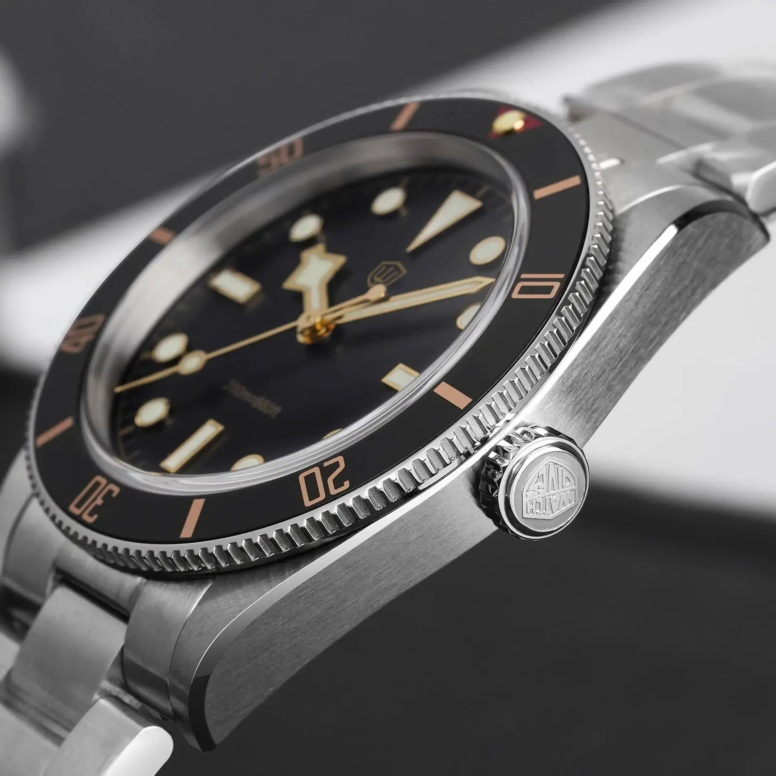 Watchdives dive watch; stainless steel case and bracelet, black dial with copper-tone markers, 37mm, rotating bezel