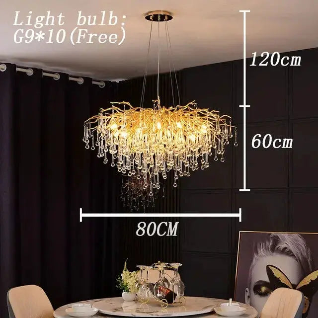 Royal Nordic crystal chandelier with gold chrome finish and water-drop crystals, 80 cm wide.