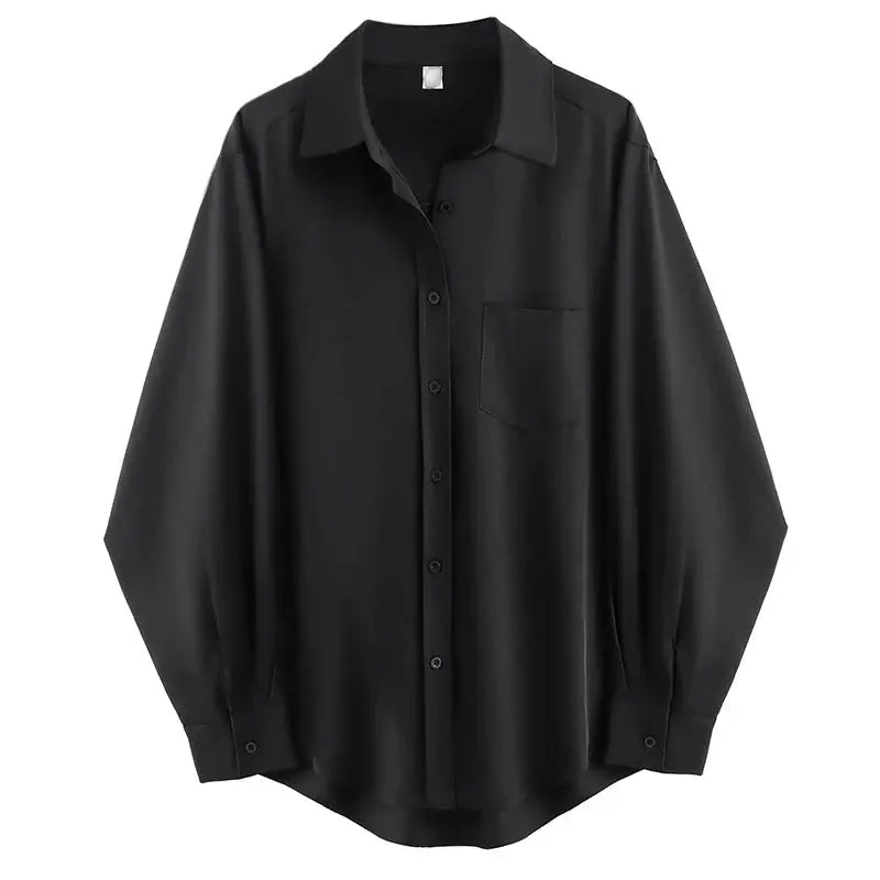 Black oversized women's button-up shirt with long sleeves and chest pocket