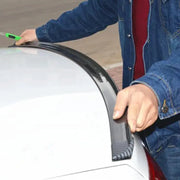 Universal 5D carbon fiber car spoiler being installed on a white car, DIY styling wing