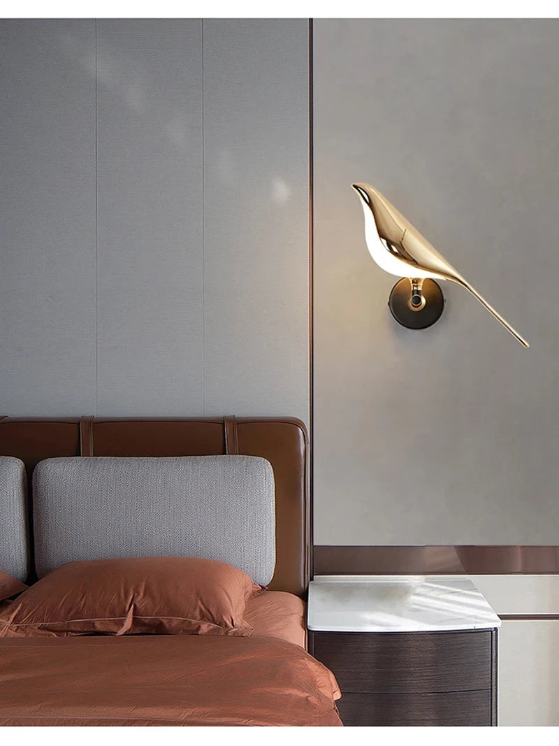 Magpie Bird LED wall lamp by Simples Market; gold metallic finish bedside wall sconce