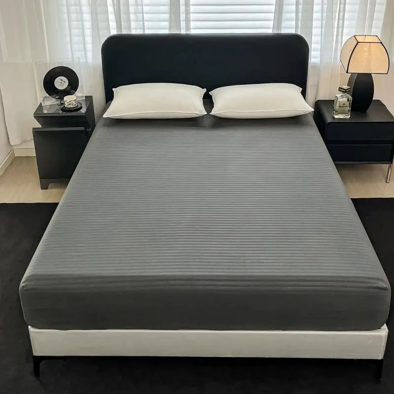 Fitted bed sheet with elastic band in solid gray for queen-size bed