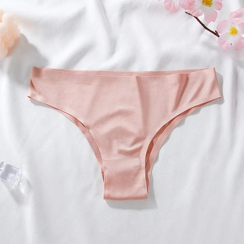 Women's seamless blush-pink T-back thong underwear in ice-silk fabric