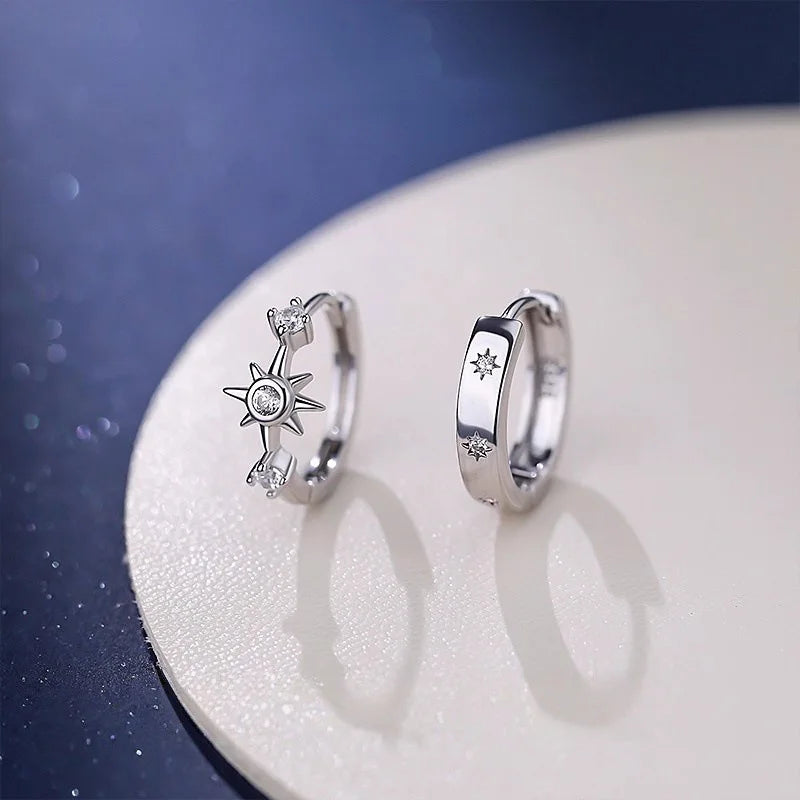 Pair of 925 sterling silver zircon star asymmetry hoop earrings by Simples Market