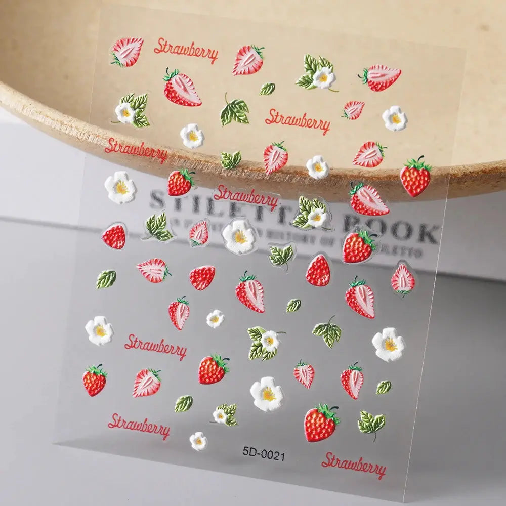 Nail sticker sheet from Simples Market featuring red strawberries, white flowers, and green leaves