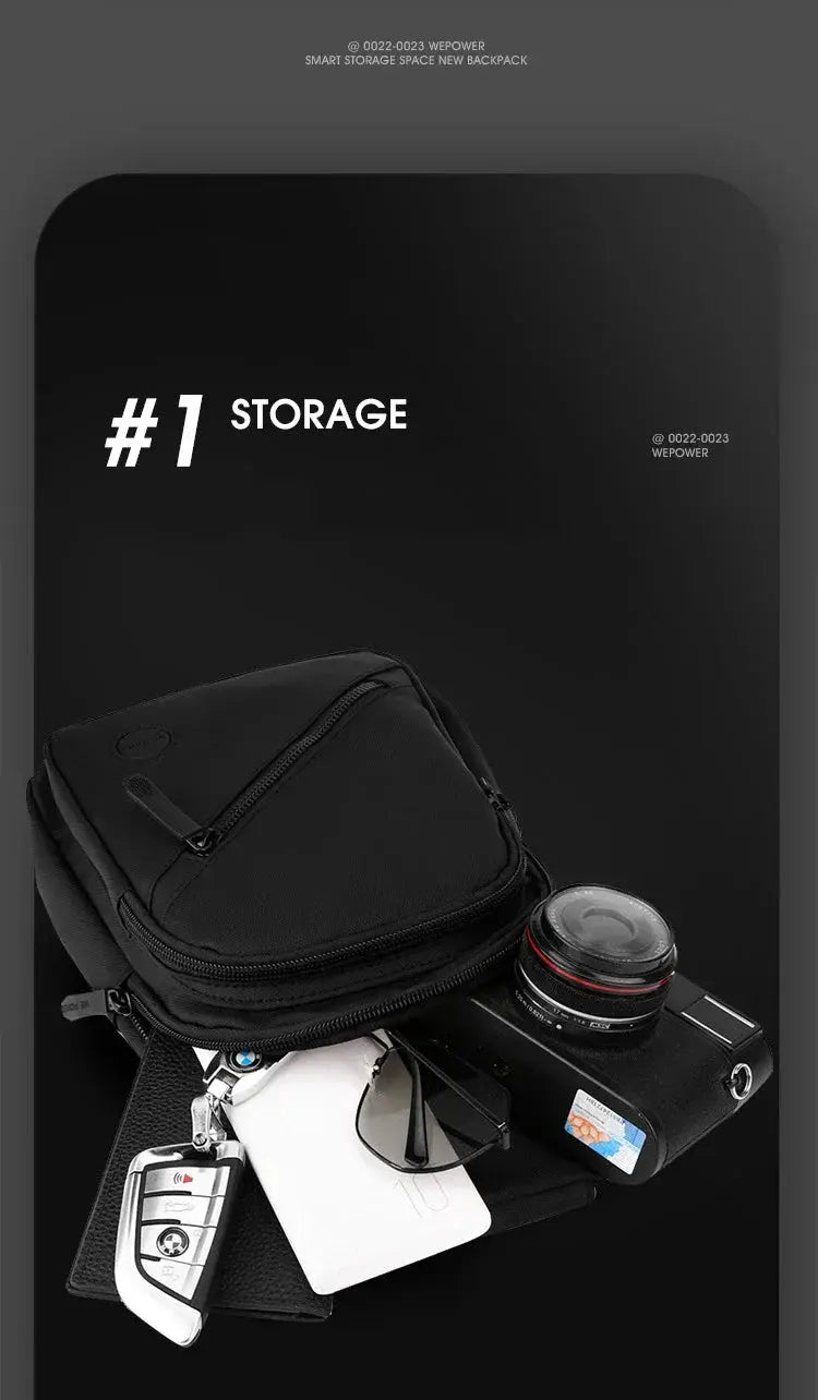 Lightweight men's chest bag, black nylon crossbody; shown with 5 items—camera, lens, sunglasses, keys and cards.
