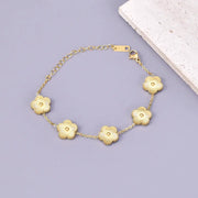 Gold-tone stainless steel bracelet for women with five-leaf flower charms on a delicate chain