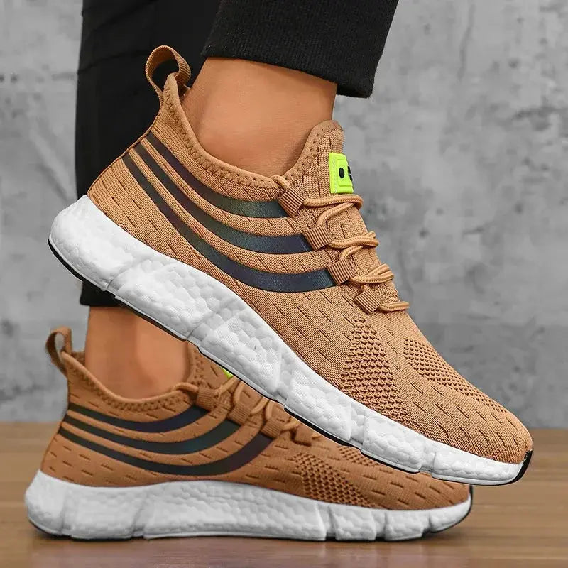 Pair of men's sneakers by Simples Market; tan knit upper, white foam platform sole, neon logo tag