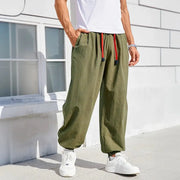 Men's harem pants olive green loose-fit cotton-linen joggers with red drawstrings, casual sweatpants