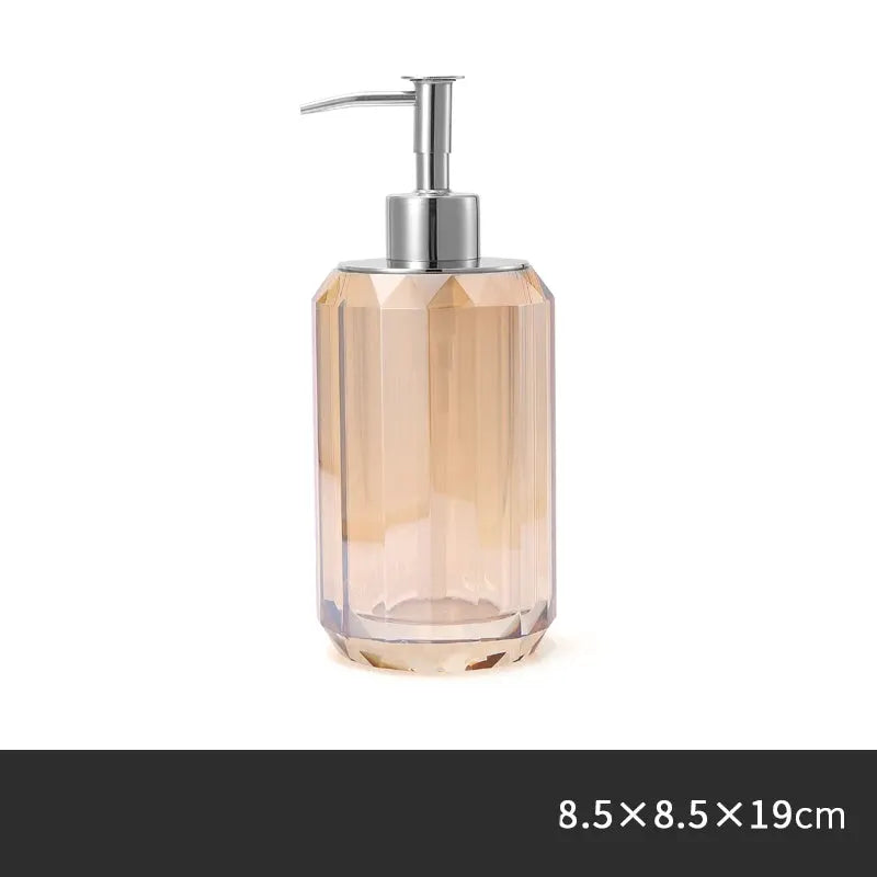 Glass lotion bottle with rose-tinted faceted crystal body and silver pump