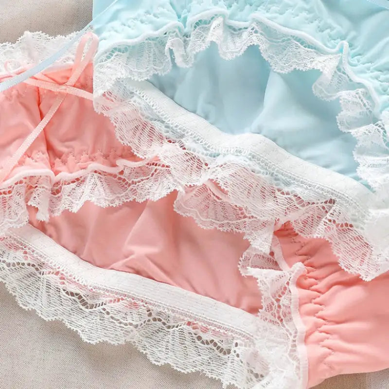Panties, two pastel lace-trim panties in pink and blue with white lace edging; low-rise breathable underwear
