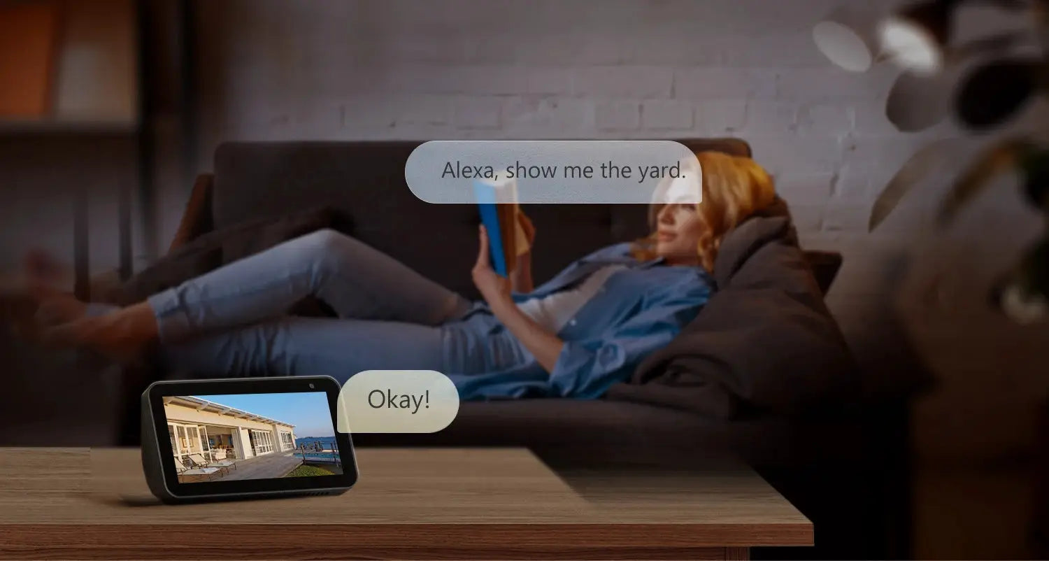 IMOU Bullet 2E outdoor security camera feed on a smart display with Alexa yard command.