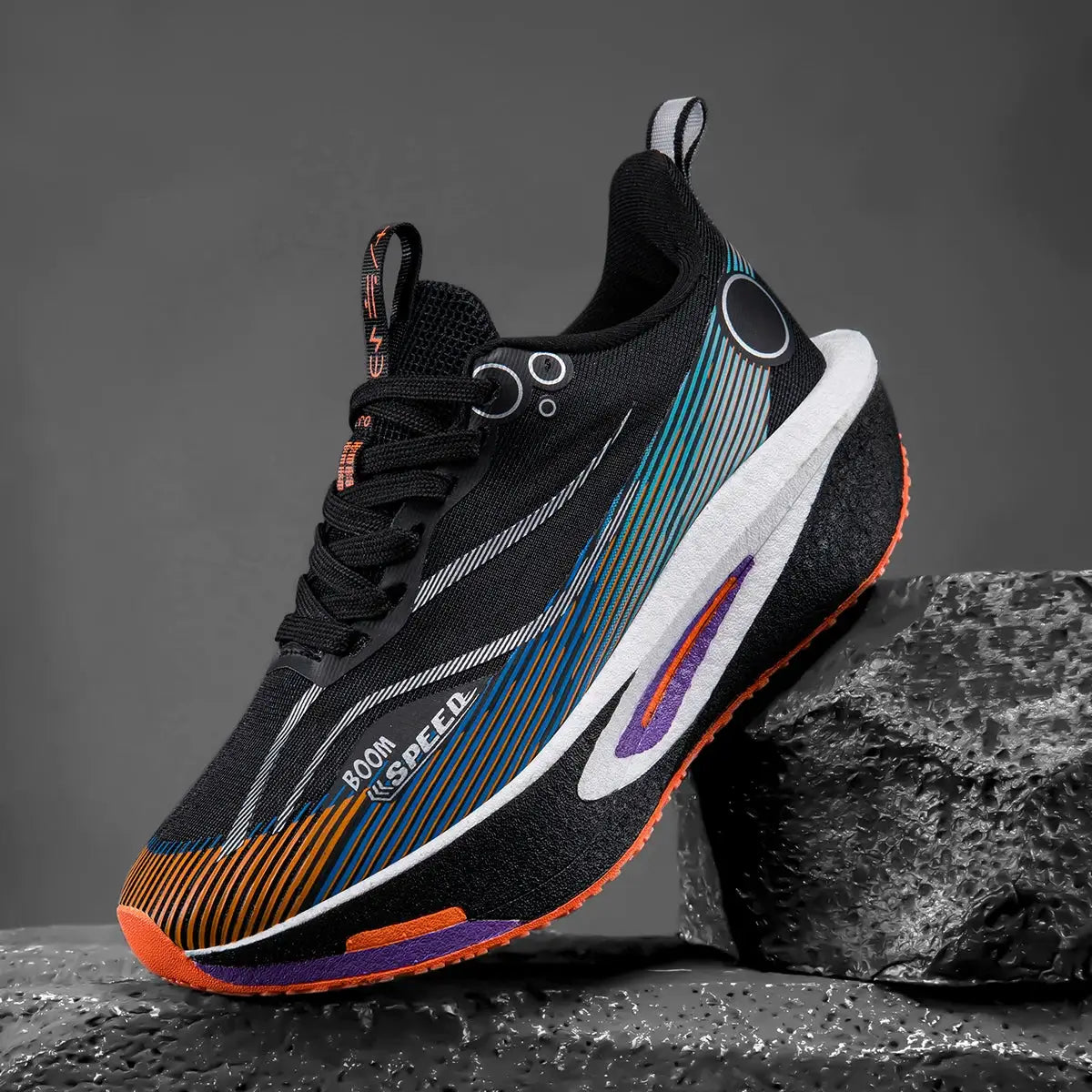 Carbon-plate running shoes in black with multicolor stripe accents; lightweight marathon racing sneakers.