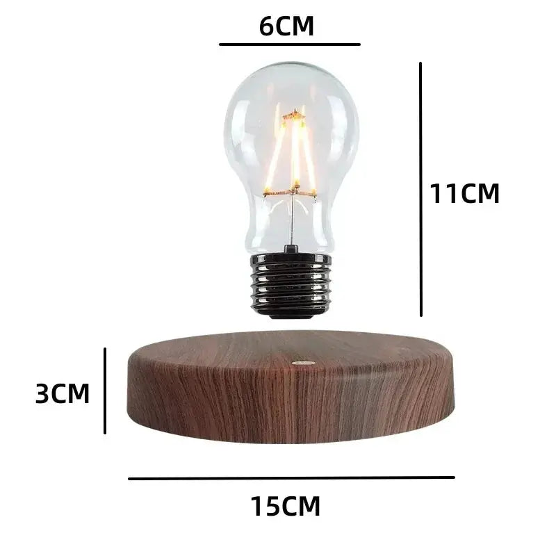 Magnetic levitation lamp with floating glass LED filament bulb over a circular wooden base by Simples Market