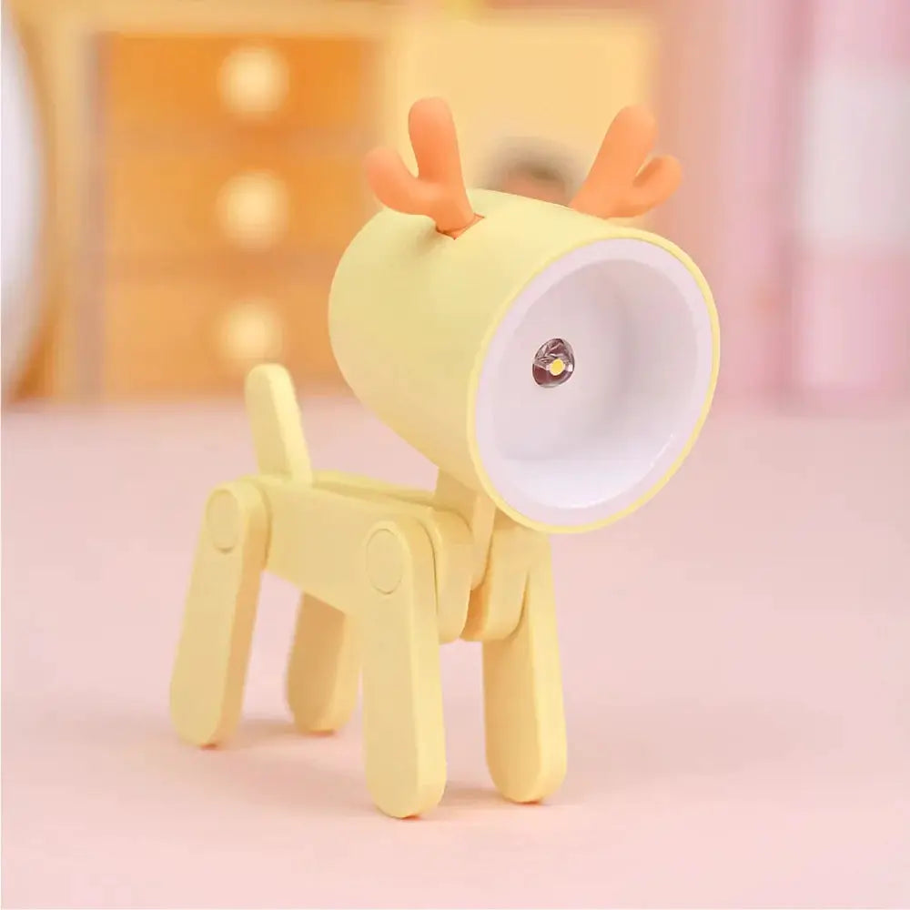 LED mini night light in yellow, cute deer-shaped desk lamp with a round head and foldable jointed legs.