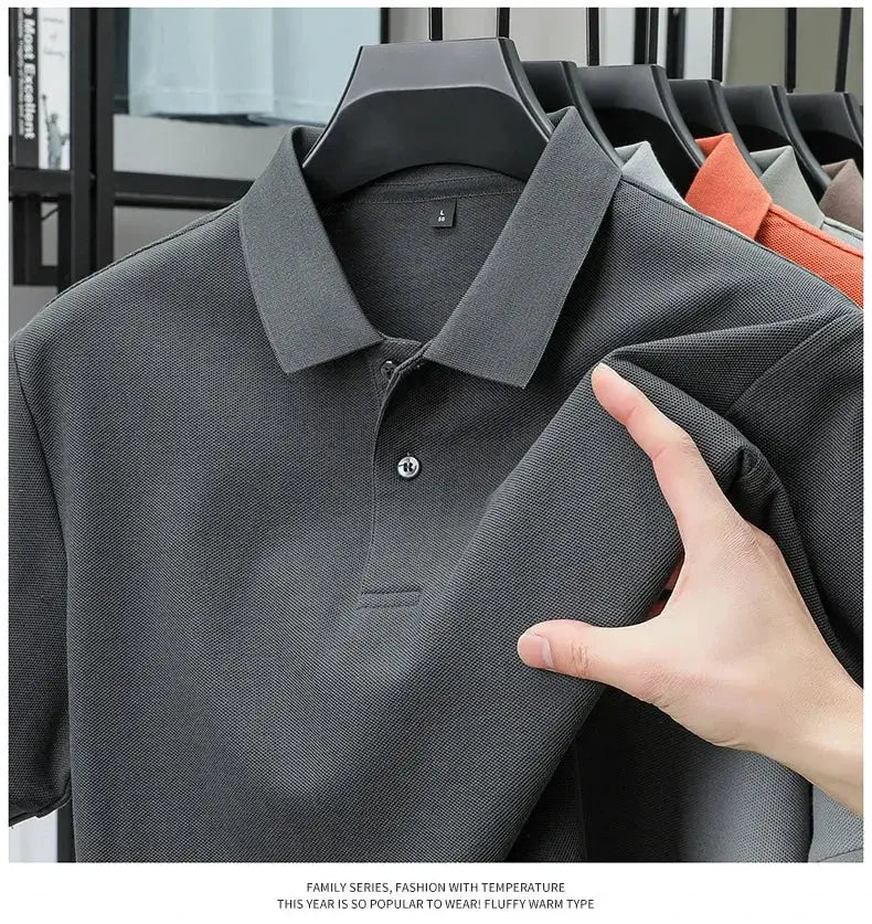 Simples Market men's grey 100% cotton polo shirts on hangers, five shirts visible.