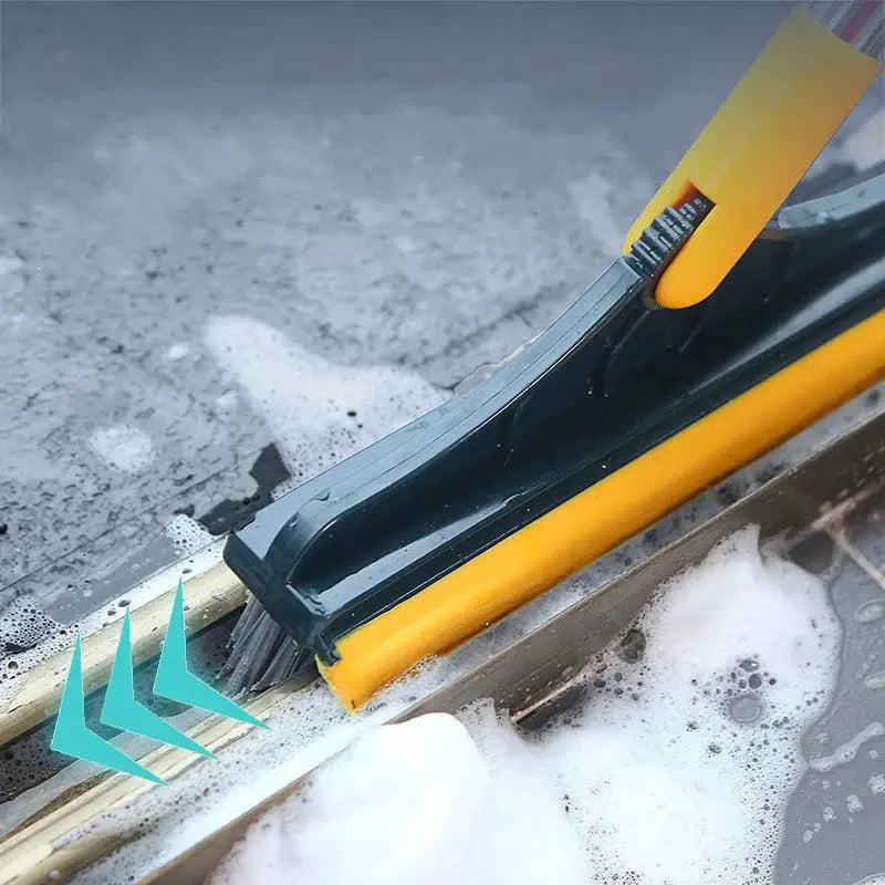 Bathroom floor brush with long yellow handle and dark bristle head for tile and wall cleaning