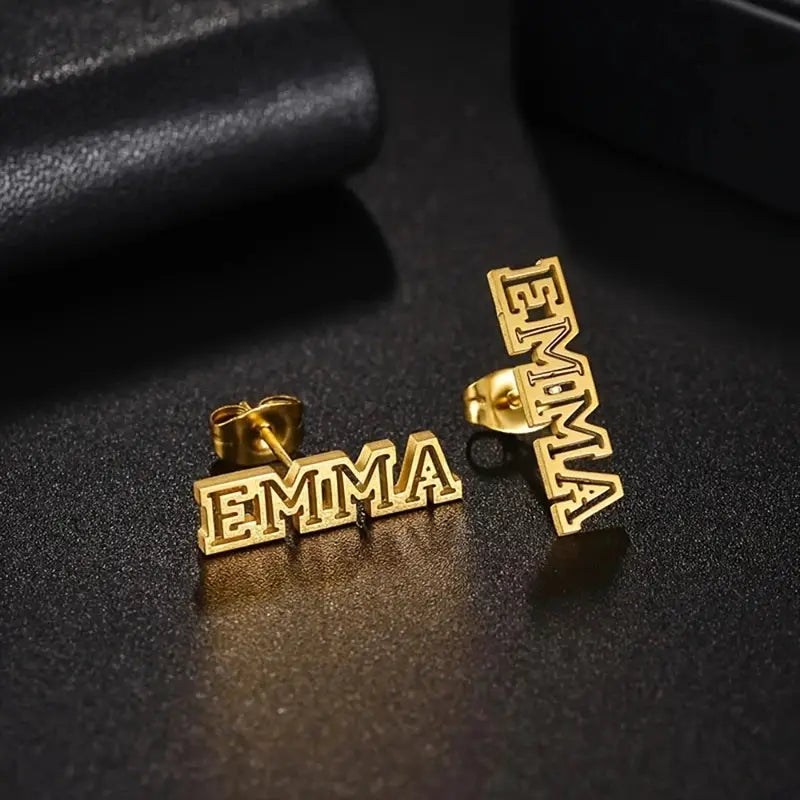 Valentine's Day custom name earrings pair, hollow gold-tone stainless steel spelling EMMA