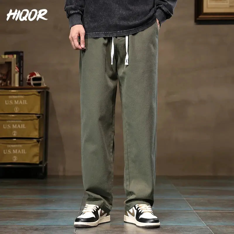 HIQOR men's olive green cotton jogger pants with drawstring waist and a loose straight wide-leg fit