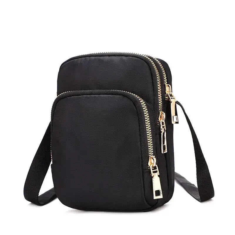 Simples Market women's black waterproof crossbody bag with dual zip compartments and shoulder strap