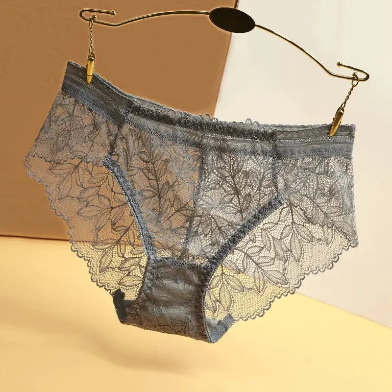 Women's gray lace panties with a floral leaf pattern, low-rise briefs hanging on a hanger.