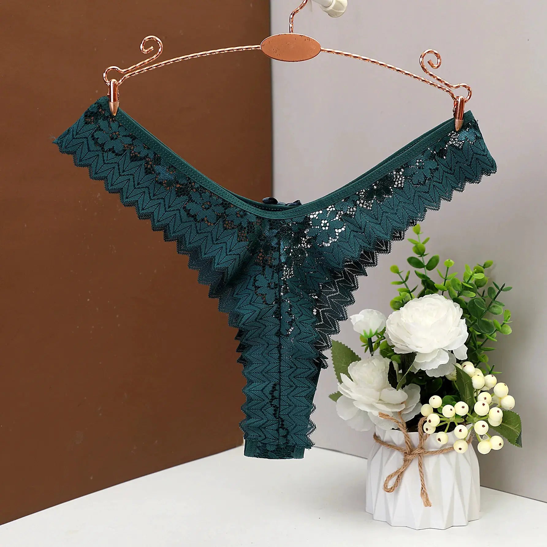Women's teal lace thong underwear by Simples Market; low-waist, breathable lace panty