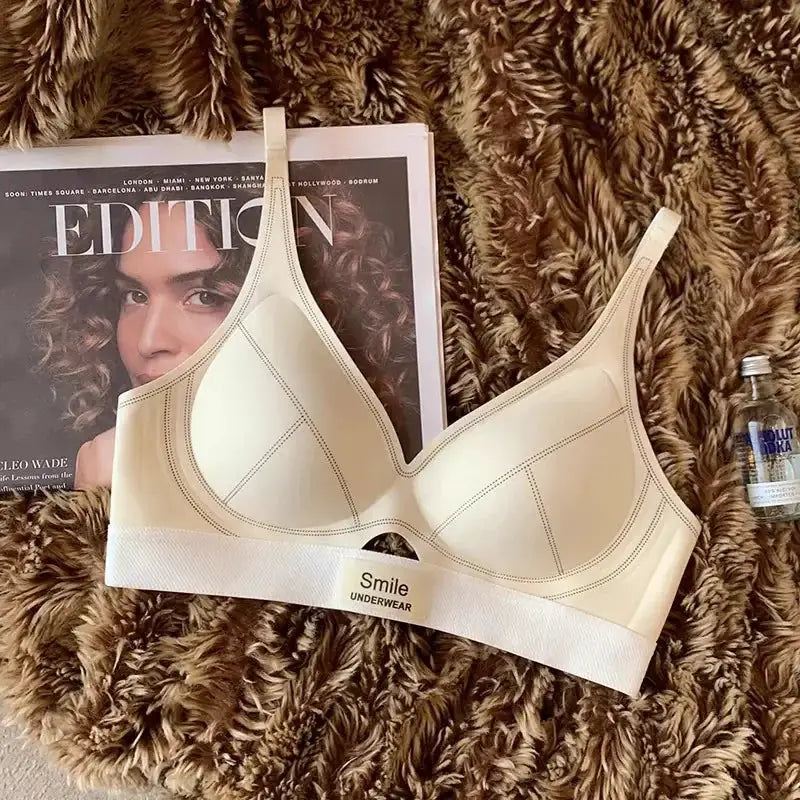 Bra, beige seamless wireless with stitched cup panels and a wide elastic band by Smile Underwear