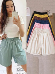 Simples Market women's cotton shorts, high-waist loose fit with two pockets; teal worn by model, other colors shown.