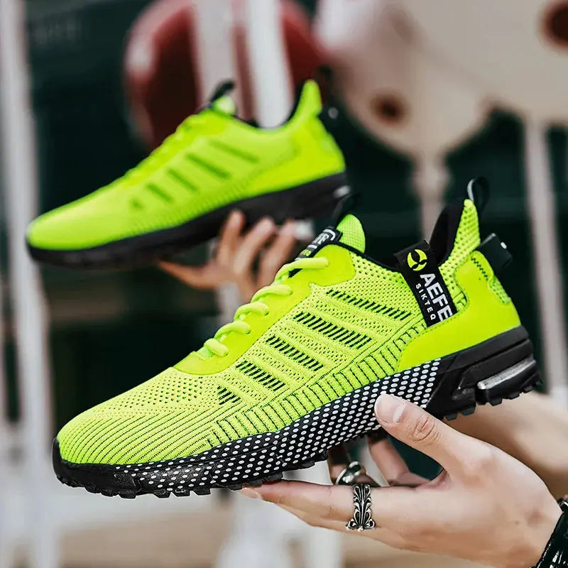 Men's neon-yellow running shoes, breathable mesh upper, black chunky sole, 2 shoes shown