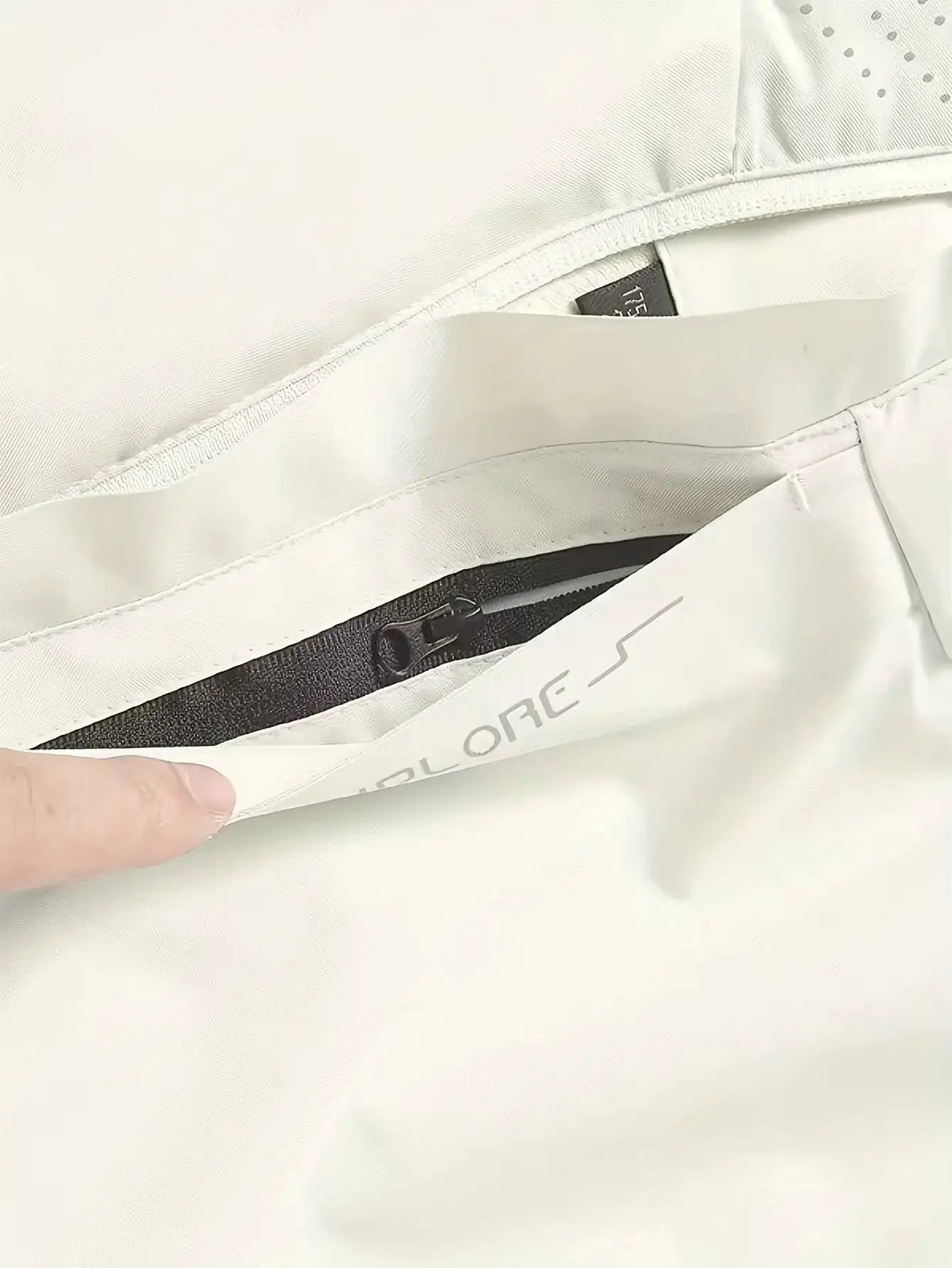 Men's white waterproof rain jacket with inner zip pocket