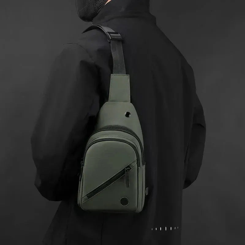 Lightweight chest bag by Simples Market in olive nylon with front zip pocket and crossbody strap.