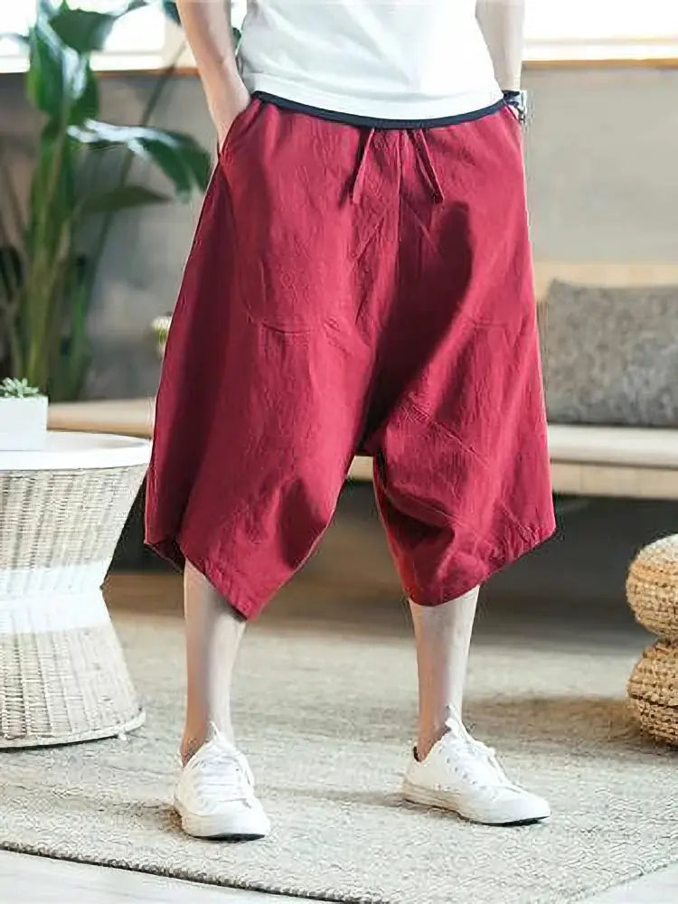 Men's red cotton-linen shorts with a loose wide-leg baggy capri fit and drawstring waist