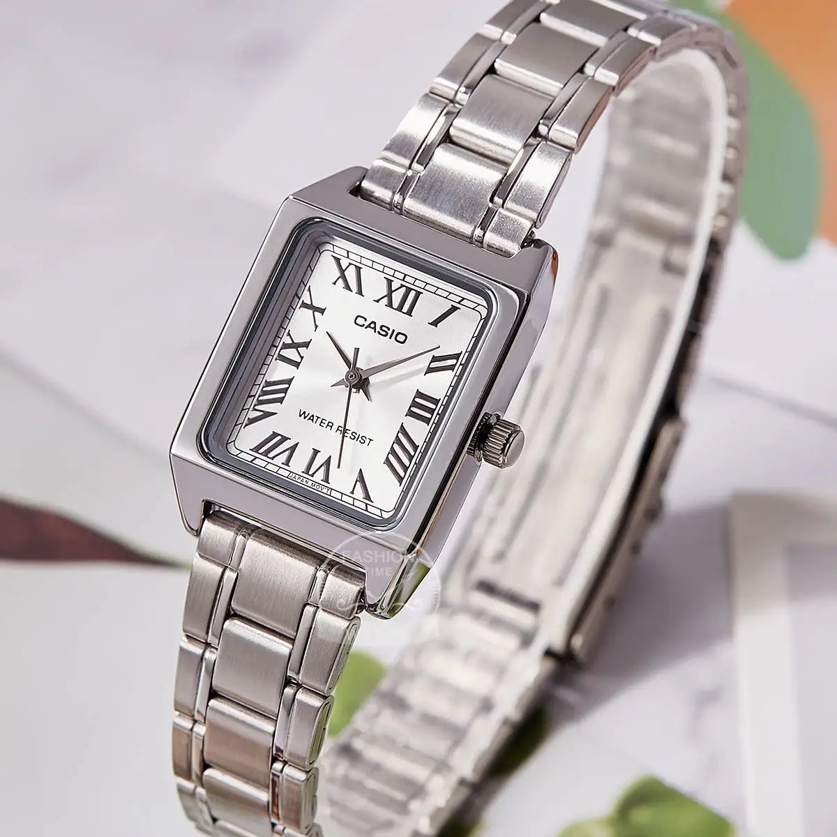 Casio women's stainless steel tonneau watch with Roman numerals, water resistant 30m