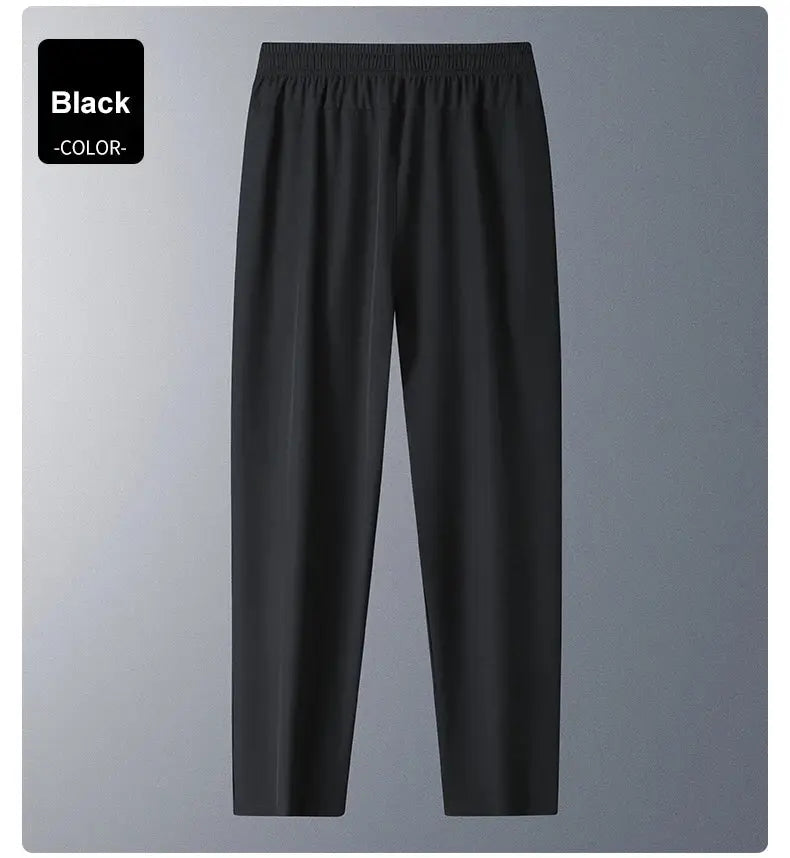 Running pants in black with elastic waistband, loose fit, full-length casual athletic trousers.