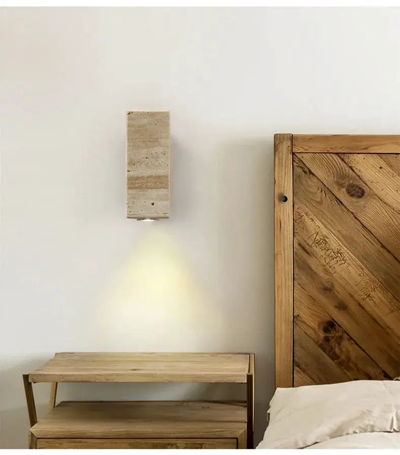 Wabi Sabi yellow travertine marble wall lamp; warm LED downlight for bedside, bedroom or living room.