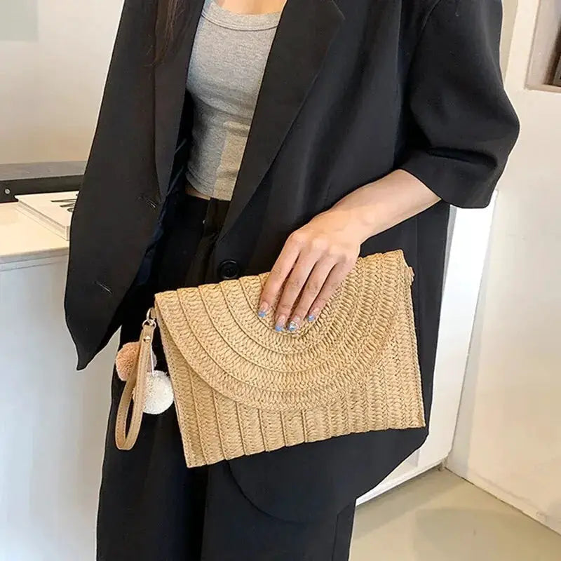Handmade straw beach shoulder crossbody clutch in beige with a woven envelope design