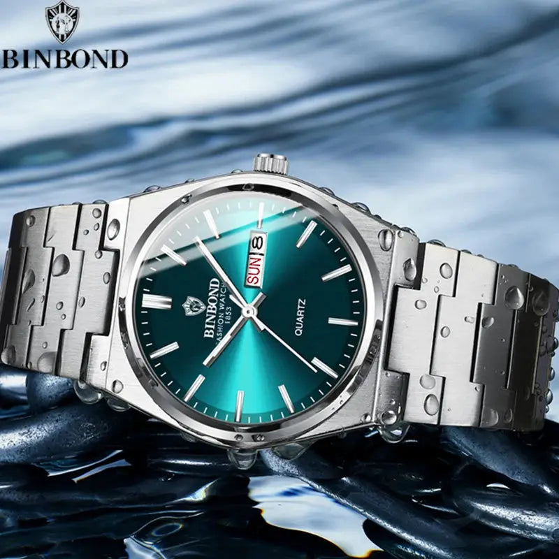 BINBOND stainless steel men's business watch with teal dial, day-date window, water-resistant metal bracelet