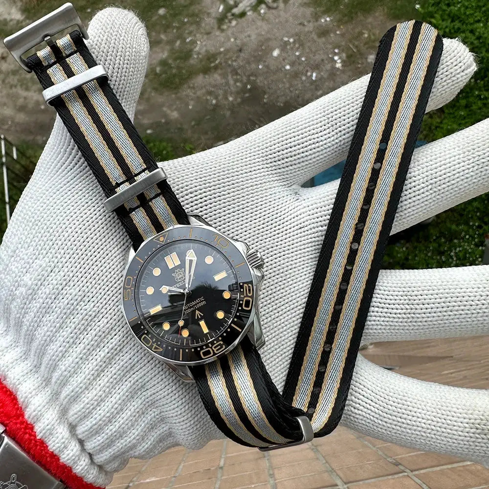 STEELDIVE SD1957 42mm dive watch with black dial, ceramic bezel, on striped NATO strap