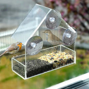 House transparent window bird feeder by Simples Market with removable suction cups and sliding seed tray