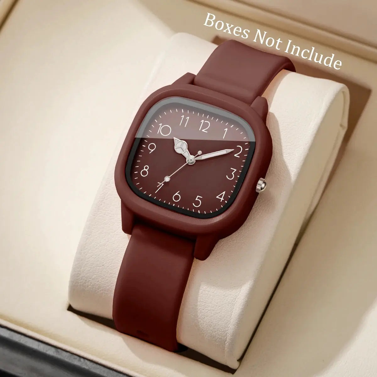 Women’s maroon silicone-band quartz watch with Arabic numerals on a rounded-square dial