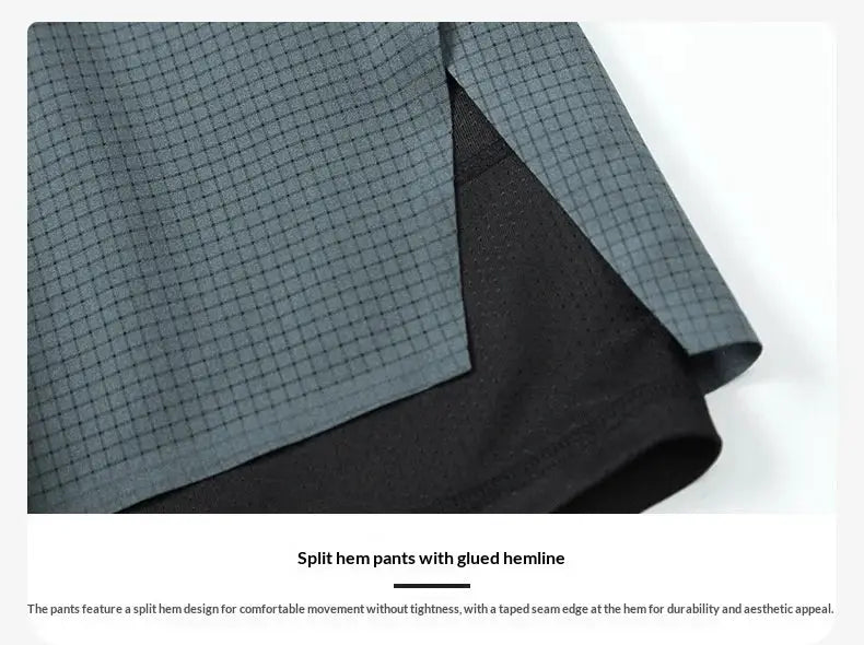 Men's double-layer running shorts with split-hem, grey grid outer over black inner lining, quick-dry breathable.